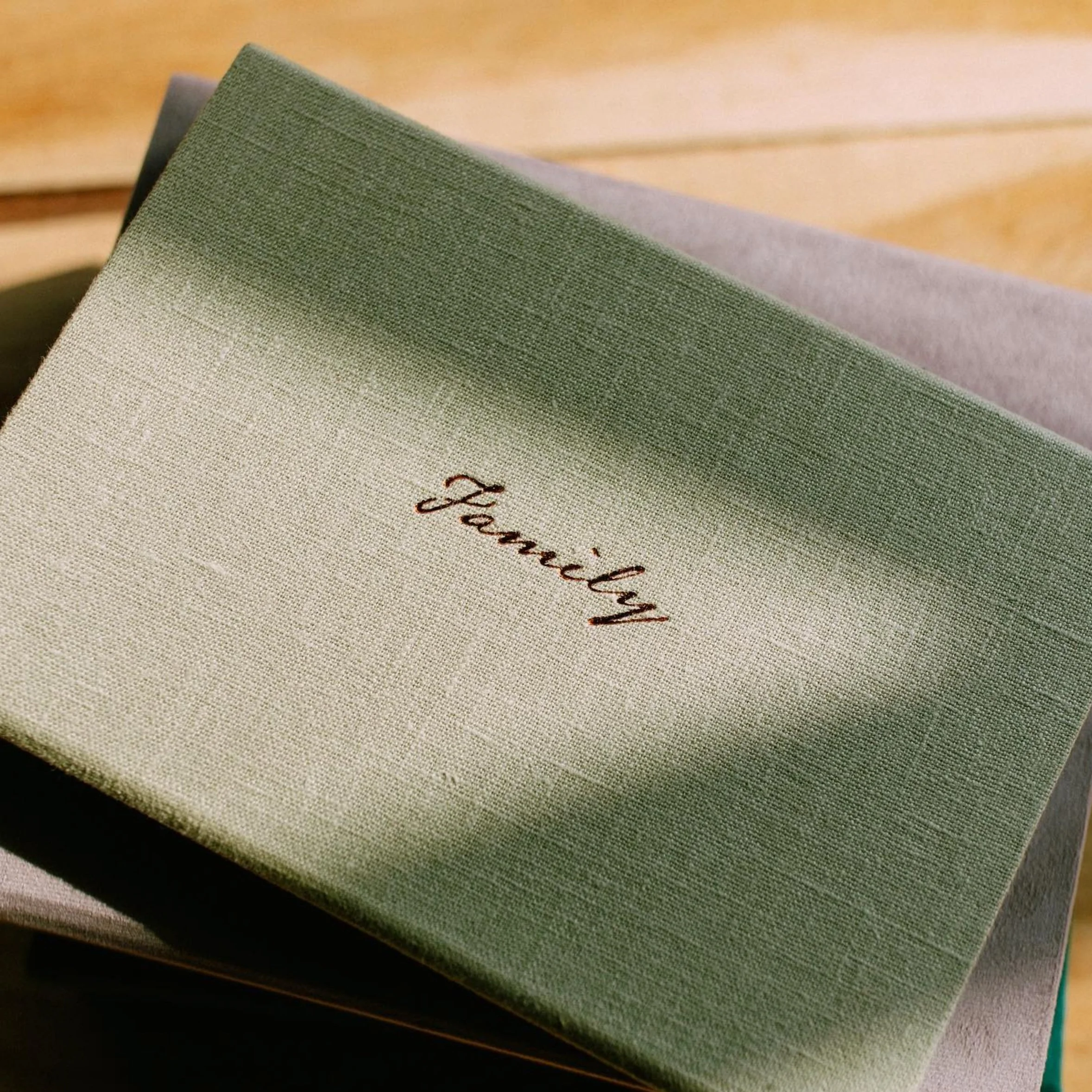 Archival heirloom prints and custom debossed linen album